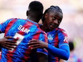 Eberechi Eze and Ismaila Sarr celebrate a Crystal Palace goal