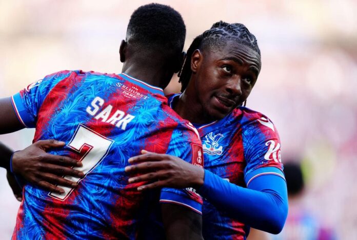 Eberechi Eze and Ismaila Sarr celebrate a Crystal Palace goal