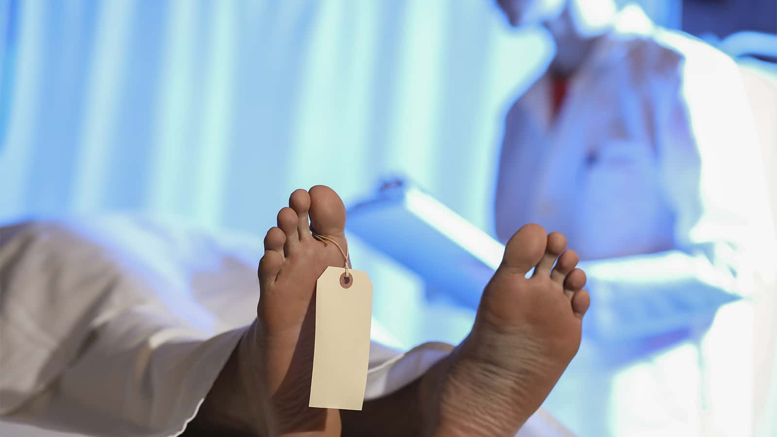 Pneumonia and Cancer Lead Causes of Death in Hospitals Medical examiner or forensic scientist with dead man